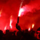 FC Dynamo Kyiv ultras support their team on the road to stadium pyro